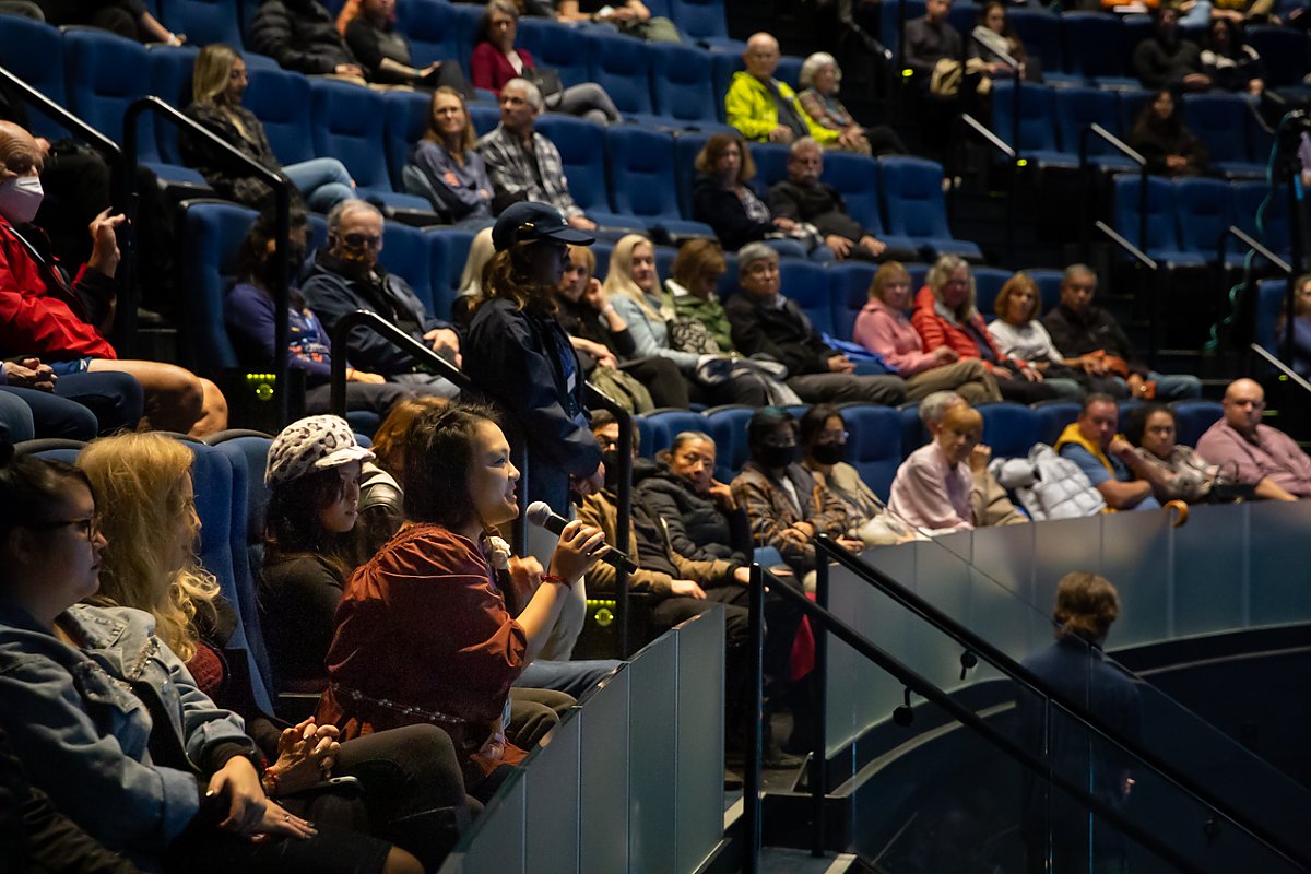 Audience member asking questions